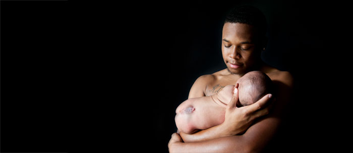 Father holding baby