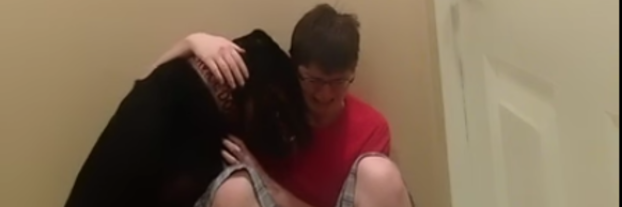 Kayden Clark Shares Video of Dog Helping Through Meltdown Kayden Clark sitting with service dog