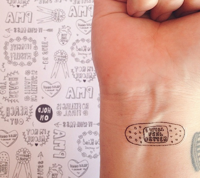 tattoo of a band aid