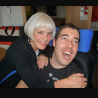 The author hugging her son