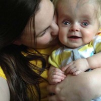 mother holding her son