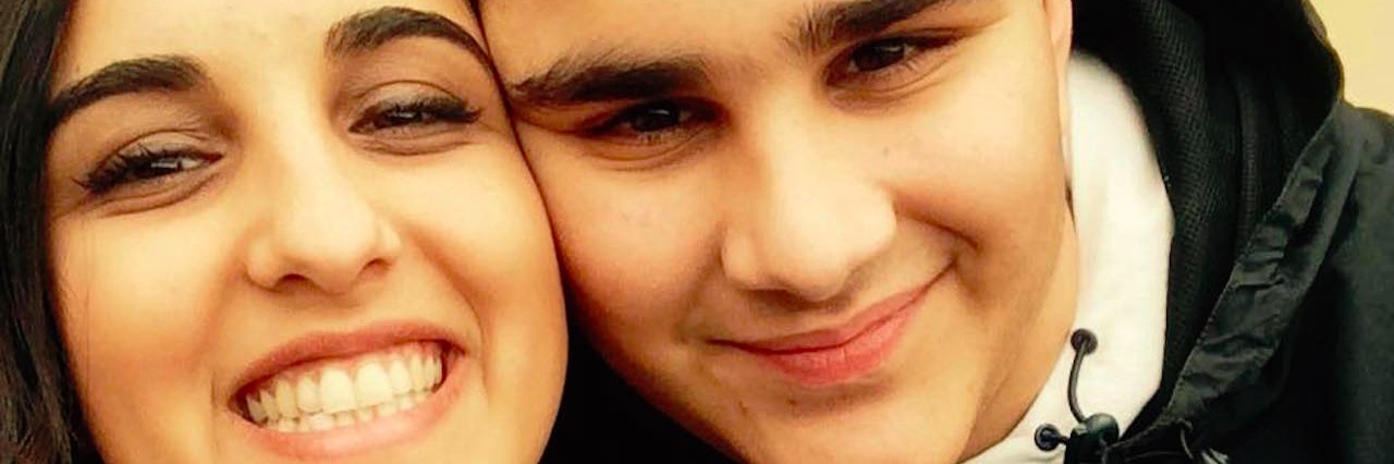 What It's Like to Be the Sister of a Boy With Autism brother and sister smiling