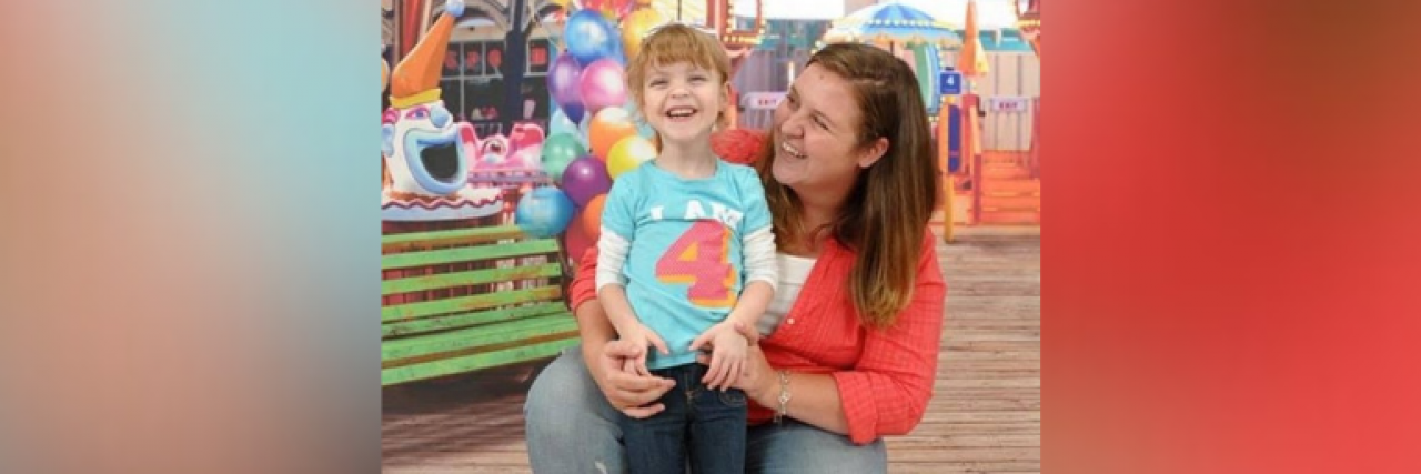 My Therapist’s Perfect Answer to ‘When Will She Be Normal?' Mother and 4-year-old daughter smiling at a fair