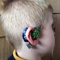 colorful hearing aid decoration by Lugs