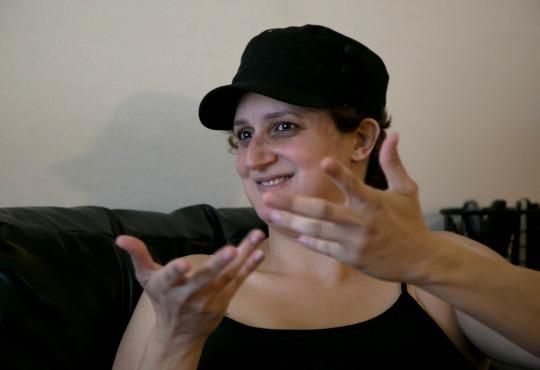 deaf woman using sign language