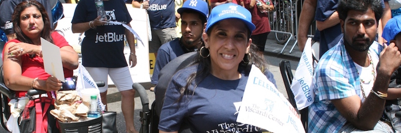 What New York City's First Disability Pride Parade Looked Like A group of people in wheelchairs at a parade