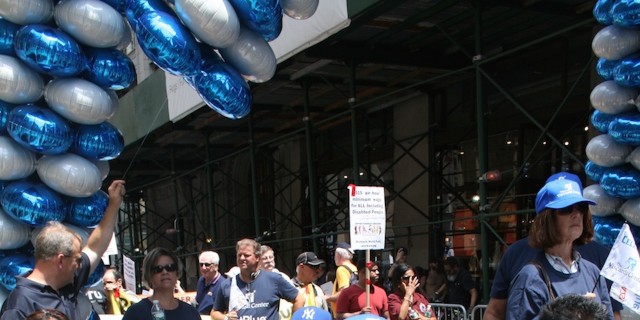 This Is What New York City's First Disability Pride Parade Looked Like A group of people in wheelchairs at a parade