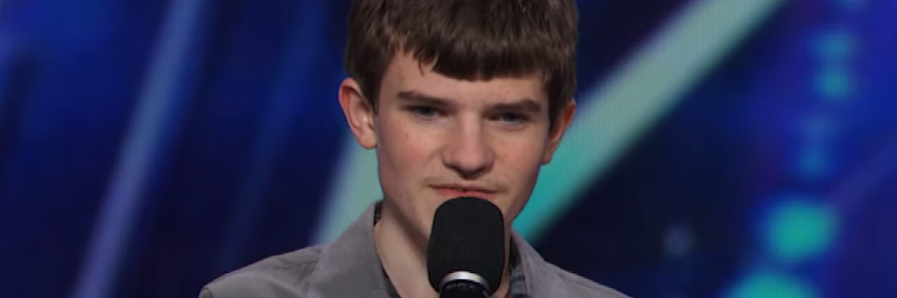 Teenage Stand-Up Comedian on the Autism Spectrum Has Us In Stitches comedian with autism on stage