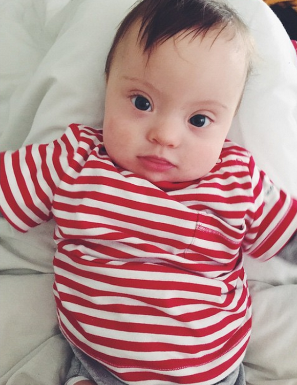 Amanda Booth's baby in a striped shirt