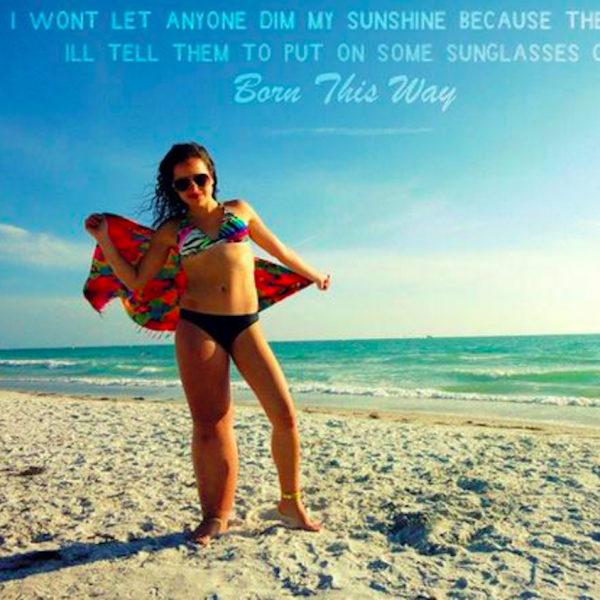A photo of a girl in her bikini with text that says, "I won't let anyone dim my sunshine because they are blinded. I'll tell them to put on some sunglasses cause I was born this way."
