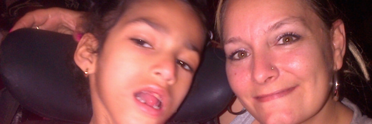 Why You Shouldn't Ask What's 'Wrong' With Someone With Disabilities mom and daughter smiling