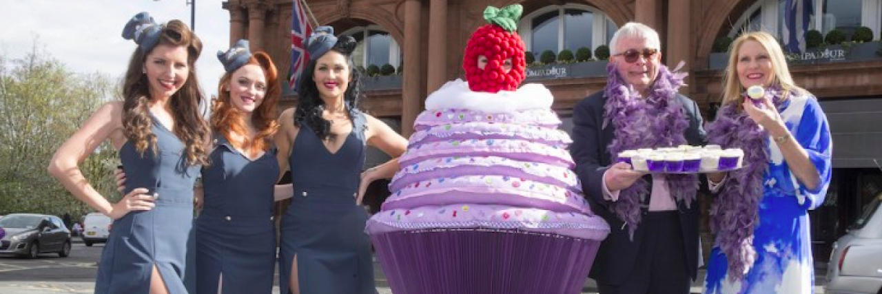 6 Unique Ways People Are Raising Money for Epilepsy Person wearing cupcake costume surrounded by others dressed up for Charity Cupcake Challenge