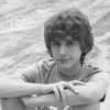 black and white photo of teenage boy