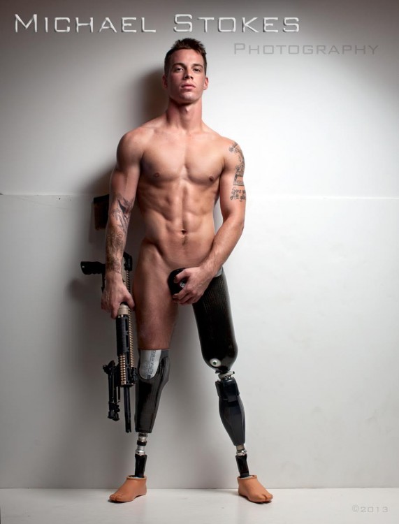 man with double leg amputation holding a weapon