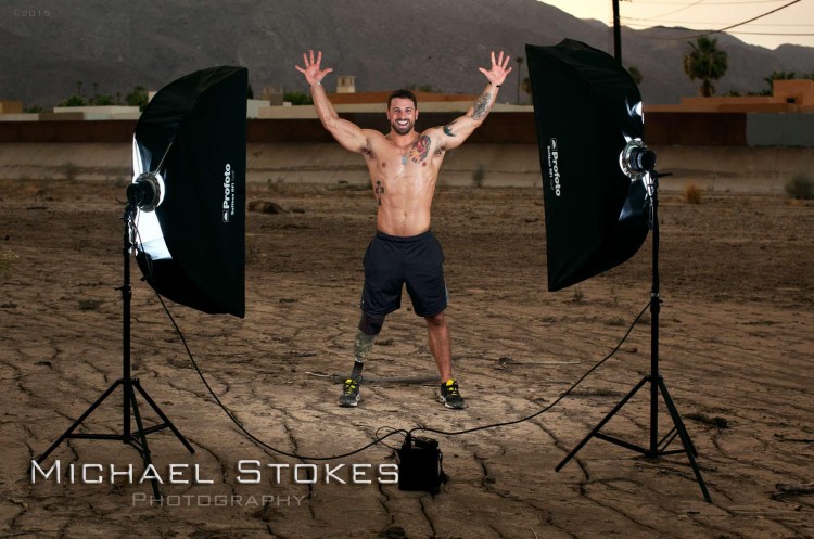 man with prosthetic legs posing for photos