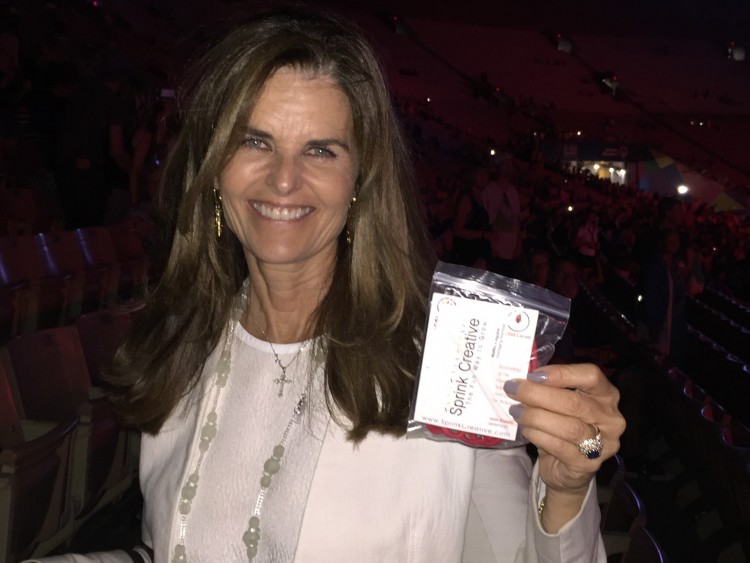 Maria Shriver holding Rocket Laces