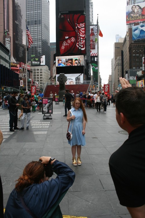 Madeline Stuart on the EverMaya photo shoot in Times Square.