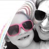 mother and daughter wearing sunglasses
