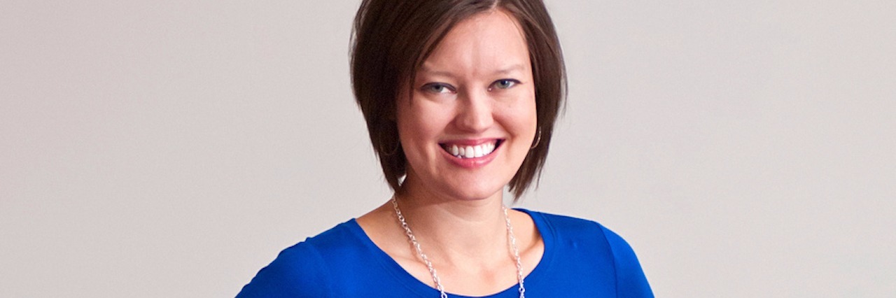 How Doctors Should Treat Their Patients woman wearing a blue shirt smiling