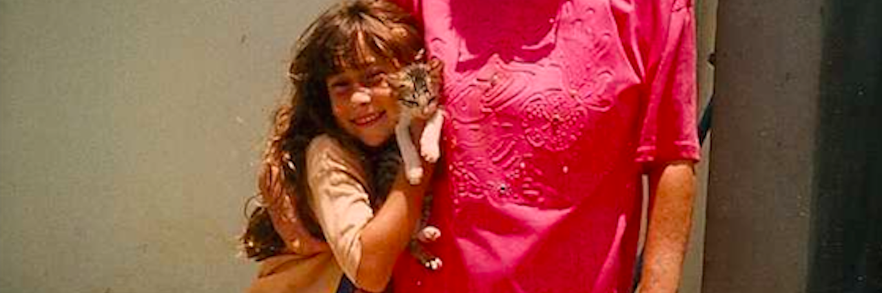 My Mother and Alzheimer's Disease Changed My Worldview young girl with older woman and cat