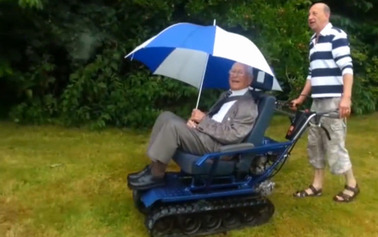 man in wheelchair designed like a tank