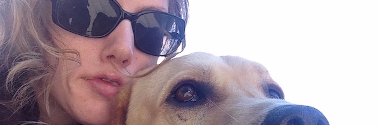 Unexpected Parts of Having a Service Dog woman with her service dog