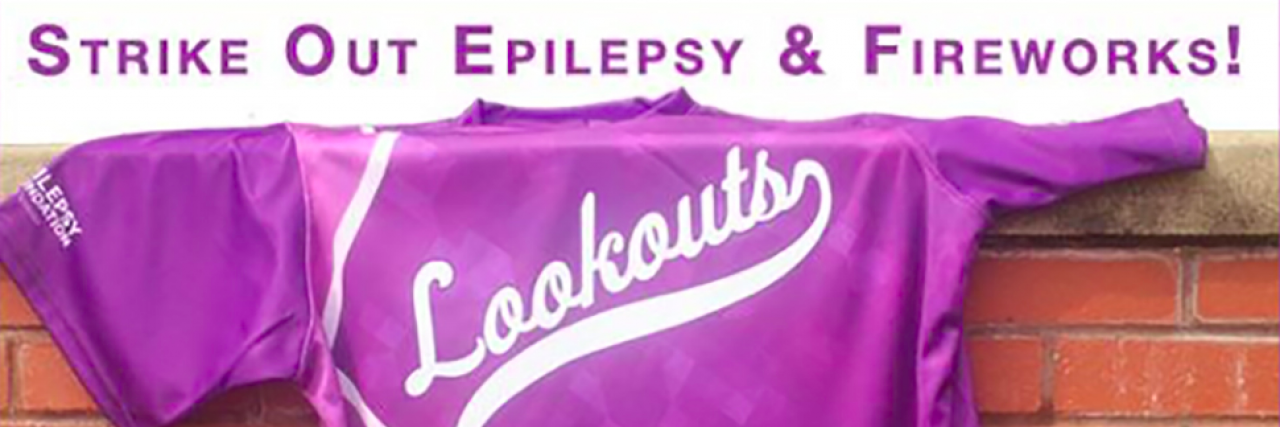 Ad for game that says "Strike Out Epilepsy & Fireworks" on purple baseball jersey