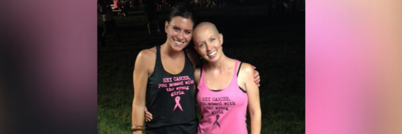 Woman With Breast Cancer Creates 'Suck It, Cancer' Clothing Line Two friends with arms around each other and wearing shirts that read "Hey Cancer, you messed with the wrong girl"