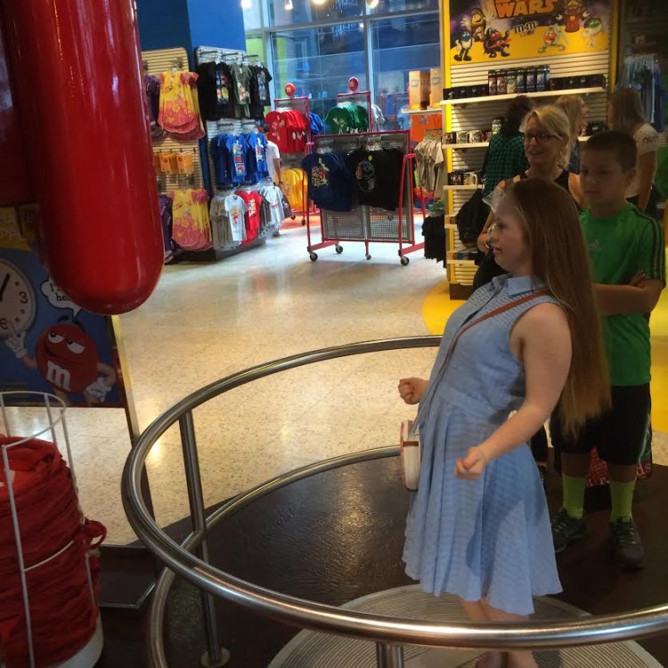 Madeline Stuart inside the M&M store in Times Square