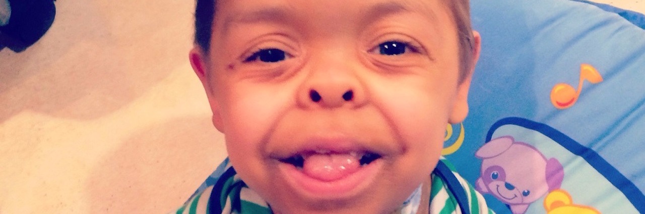 Conquering Anxiety as the Mom of a Boy With Dwarfism young boy smiling at camera