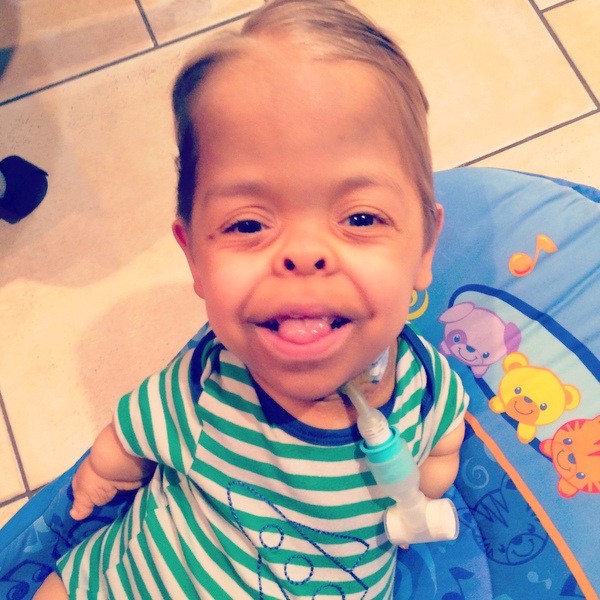 young boy smiling at camera