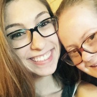 Kayla and her friend smiling