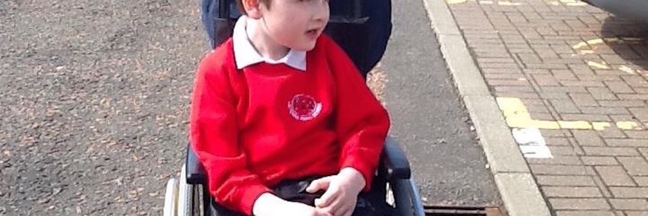 When My Son's Invisible Disability Became Visible Miriam's son in a wheelchair