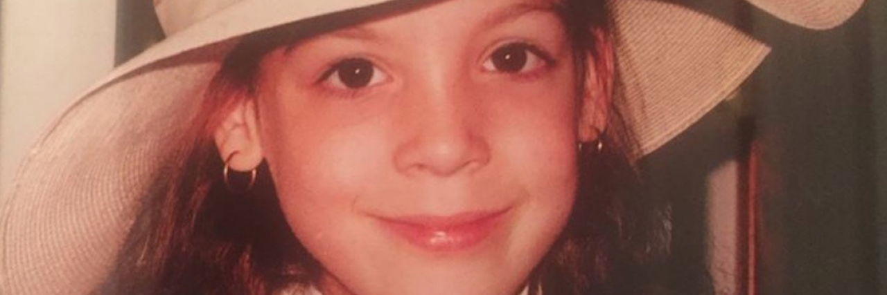 10 Things I Wish I Could Tell My Childhood Self About Cerebral Palsy The author as a child wearing a hat