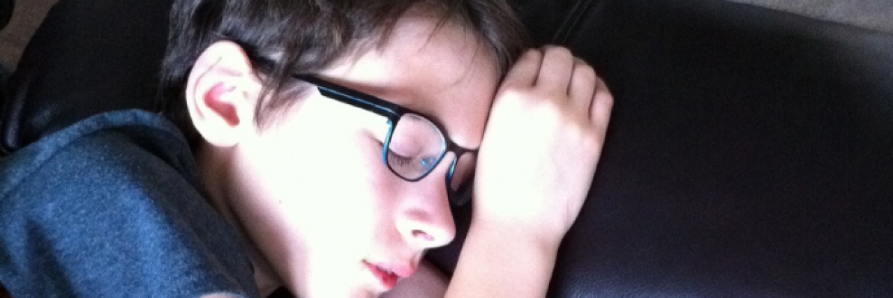 Contributor's young son sleeping on couch