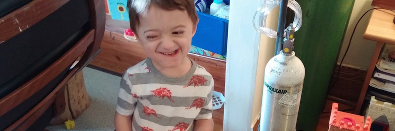 The One Sentence I Want All Special Needs Parents to Stop Saying boy with toy in hand