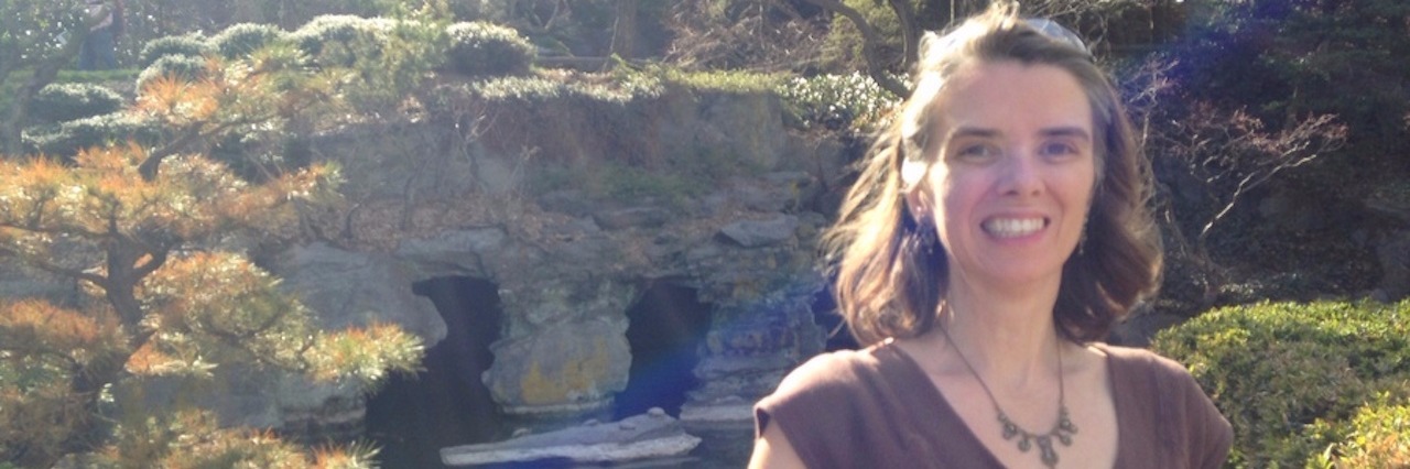 Getting Accused of Not Having a Disability Michelle smiling outside