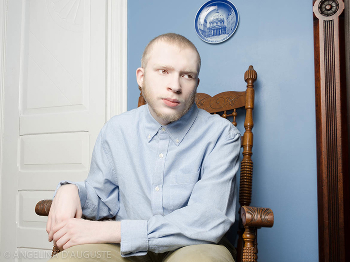 man sitting on chair Image courtesy of Angelina d'Auguste