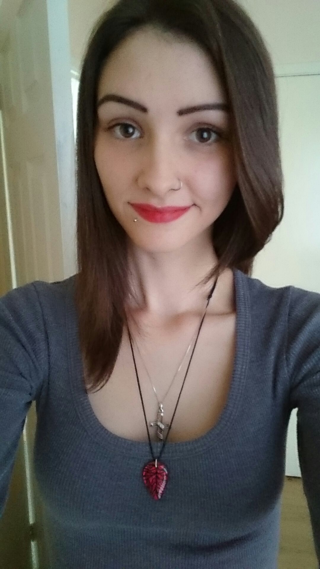 Young woman with red lipstick. 