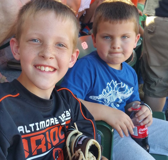 two young boys in a stadium