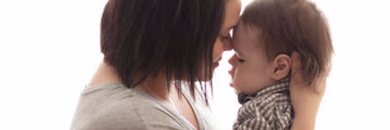 When I Feel Inadequate as a Special Needs Parent author holding her son