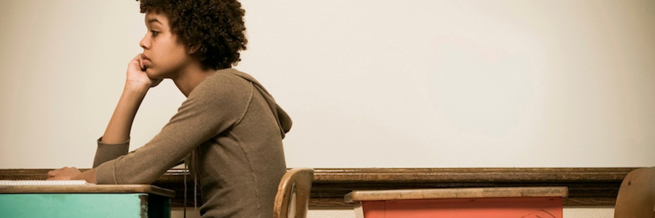 For College Students Who Are Told Their Psychology Major Is a Waste Student sitting at a desk in a classroom