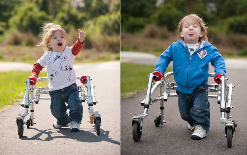 A young boy using a walker. 