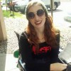 Woman in a wheelchair wearing a Misfits band t-shirt