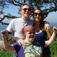 husband, wife, and his sister with down syndrome