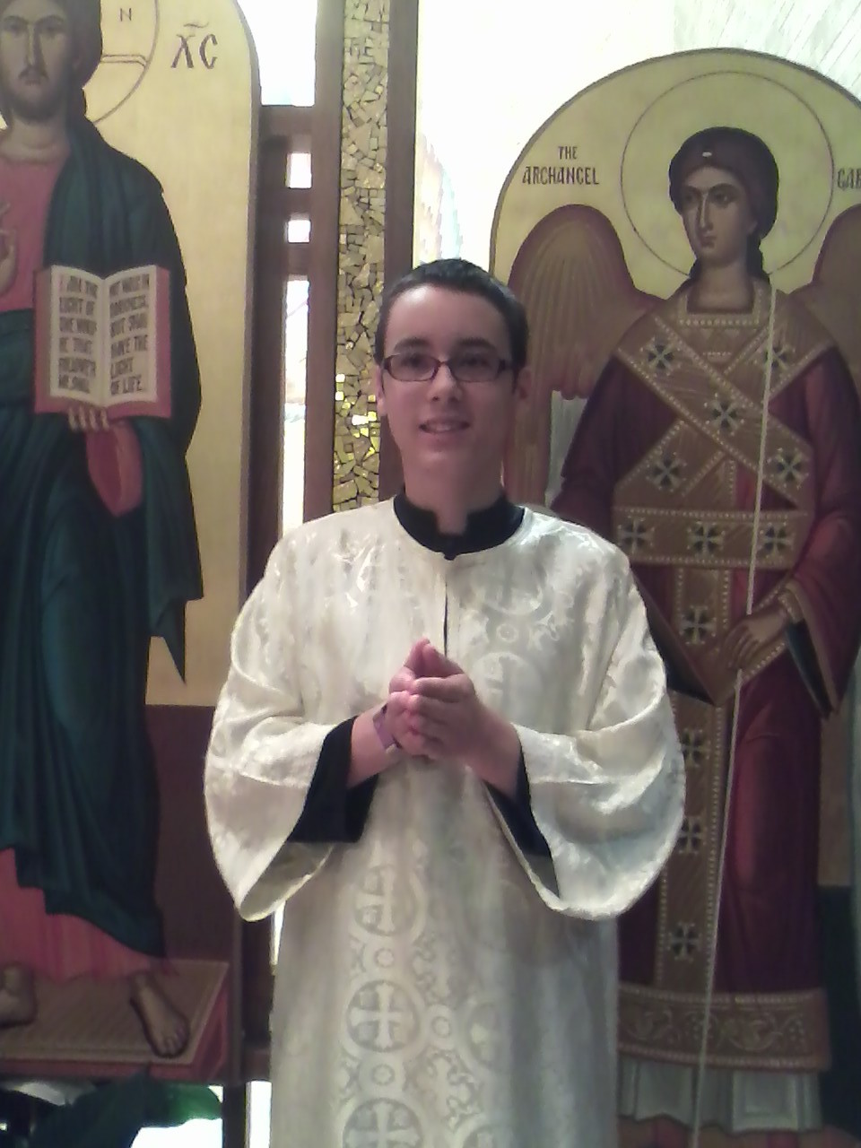 boy participating in religious activities