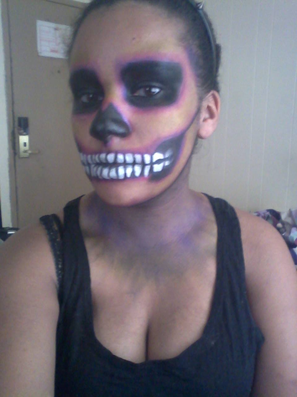 A woman with Halloween makeup on. 