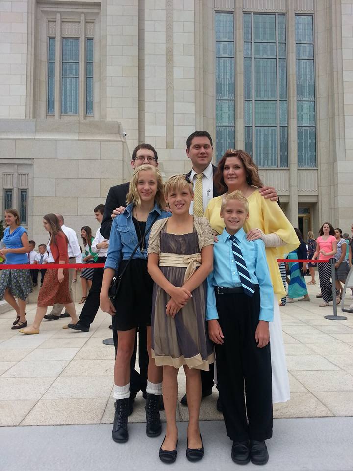 Family dressed up nicely. 