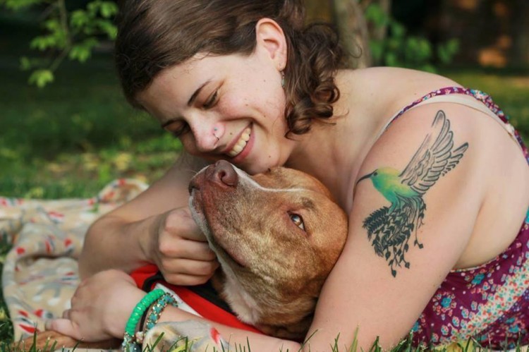 A tattoo of a hummingbird on a woman's arm