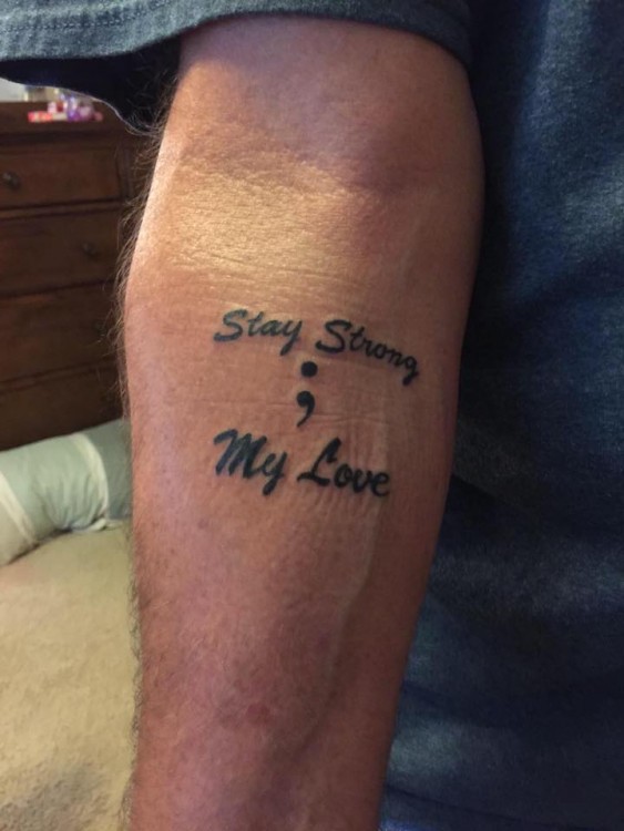 Tattoo that says "Stay Strong ; My Love". 